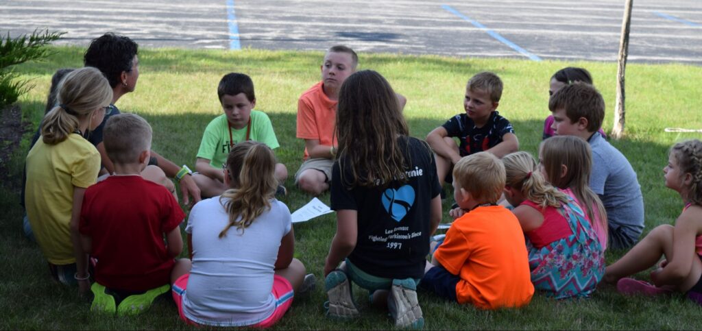 kids sitting outside